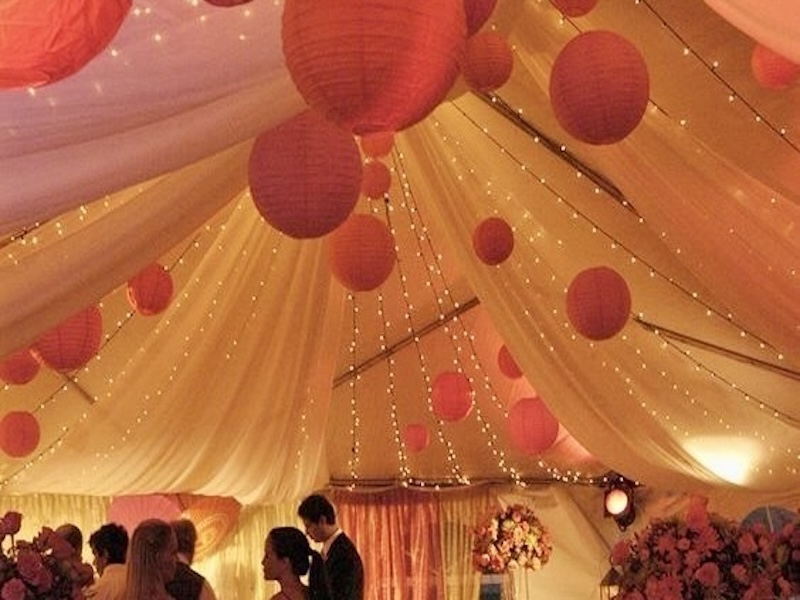 Décoration lumineuse et vélum pour soirée de mariage sous tente à Neuilly par DUOZ'Events.